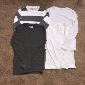 Four medium boys long sleeve thermals